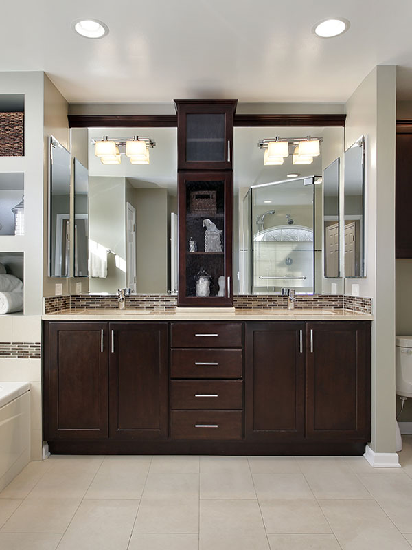 Master bath with dark wood cabinetry